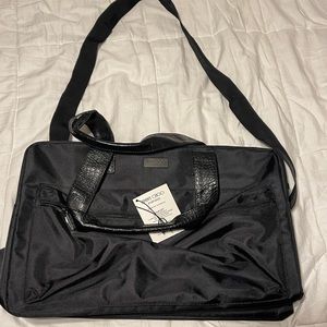 Jimmy Choo bag with leather handles